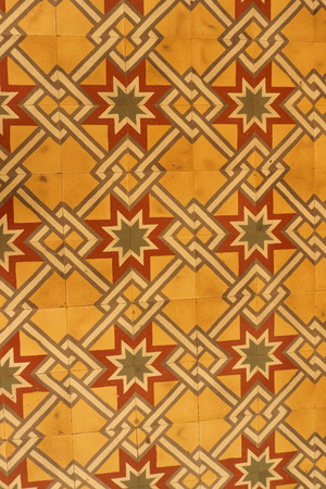 Colonial house architecture Vintage floor tiles with orange, green, red as a decorative design patternの写真素材