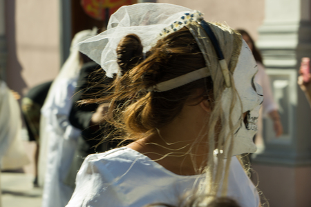 Granada, Nicaragua â February 15, 2017:  People wearing traditional dress and colorful masks during celebration of Carnival. Nicaragua traditional folkのeditorial素材