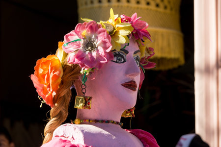 Granada, Nicaragua â€“ February 15, 2017:  People wearing traditional dress and colorful masks...