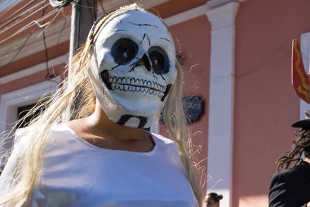 Granada, Nicaragua â February 15, 2017:  People wearing traditional dress and colorful masks during celebration of Carnival. Nicaragua traditional folkのeditorial素材