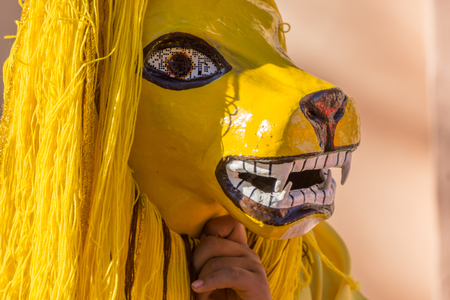 Granada, Nicaragua â February 15, 2017:  People wearing traditional dress and colorful masks during celebration of Carnival. Nicaragua traditional folkのeditorial素材