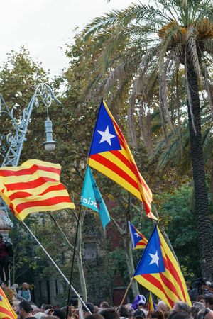 Barcelona, Catalonia, Spain, October 10, 2017: flags and people on rally support for independence of Catalunya or Catalonia in Passeig Lluis Companys.のeditorial素材