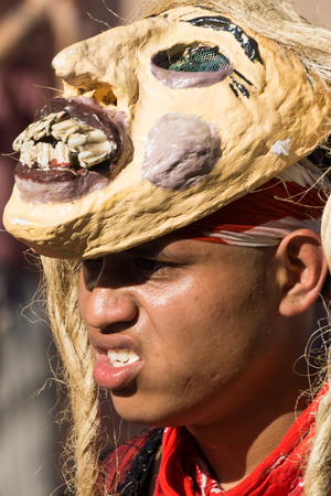 Granada, Nicaragua â February 15, 2017:  People wearing traditional dress and colorful masks during celebration of Carnival. Nicaragua traditional folkのeditorial素材