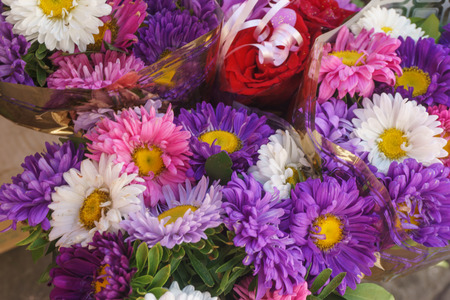 colorful flowers on sell in the shopの写真素材