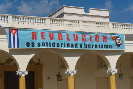 Santa Clara, Cuba, January 4, 2017: Revolutionary banner from cuban party on streetのeditorial素材