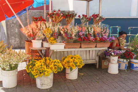 Santa Clara, Cuba, January 5, 2017: selling flowers on street near the central park in Santa Clara, Cuba.のeditorial素材
