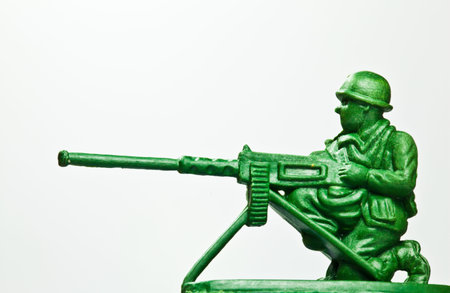 The closeup isolated image of the green toy soldier