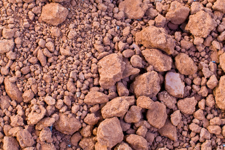 The background image of the pile of dry soil