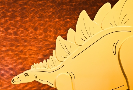 The decoration by the sculpture of a dinosaurの写真素材