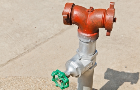 The Old Fire Hydrant Installed on the Streetの写真素材