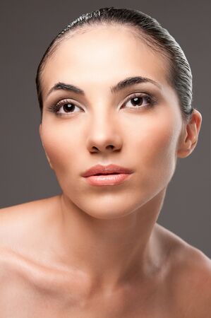 Beauty and fashion female model looking away, perfect skin and makeupの写真素材