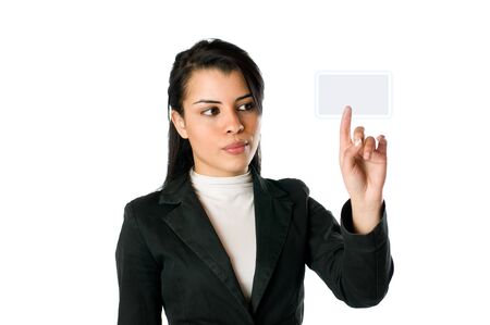 Young businesswoman pushing an empty button on a touch screen. You can write on it whatever you want!の写真素材