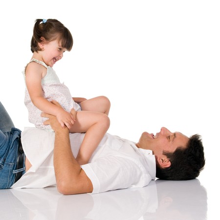 Father have fun with his adorable daughter isolated on white backgroundの写真素材