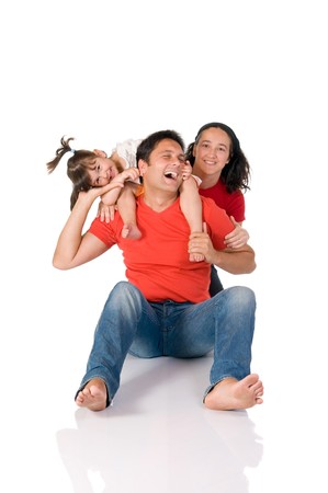 Happy joyful family playing together isolated on white backgroundの写真素材