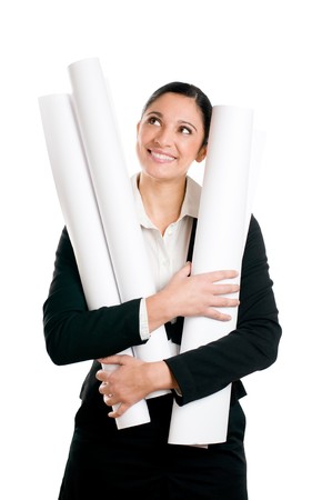 Beautiful young architect in suit dreaming while holding her plans isolated on white の写真素材