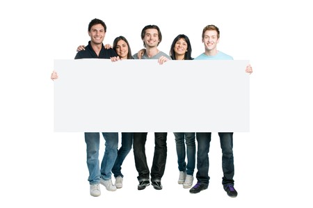 Happy young group of people standing together and holding a blank sign for your text, isolated on white backgroundの写真素材