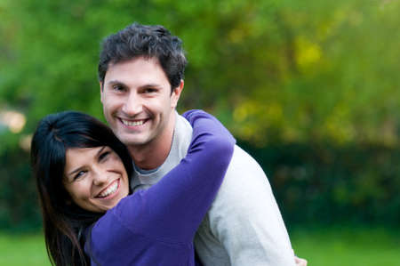 Young beautiful latin couple have fun together outdoor in the natureの写真素材