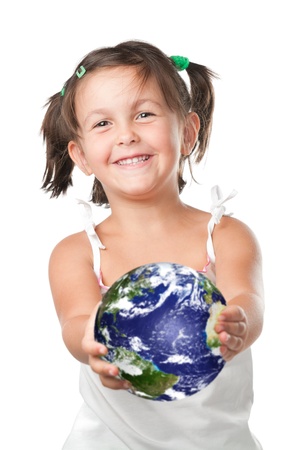 Happy smiling little girl holding and offering planet heart, symbol of environmental conservation and green attitudeの写真素材