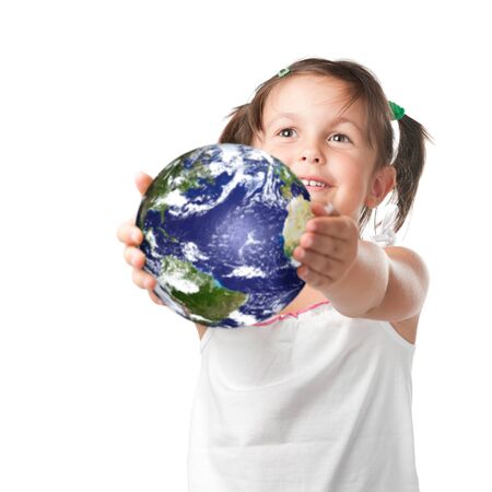 Adorable smiling little holding and offering a planet earth, symbol of environmental conservation, isolated on white backgroundの写真素材