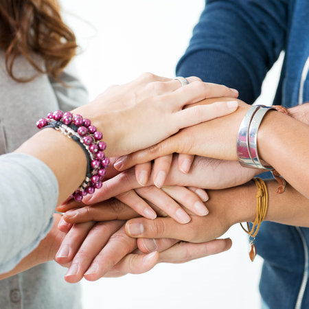 Group Of Teens Stacking Their Hands, Unity and Solidarity