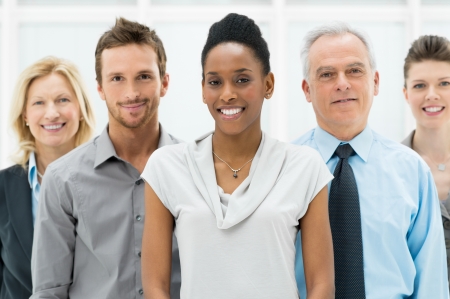 Happy smiling multi ethnic business team in office