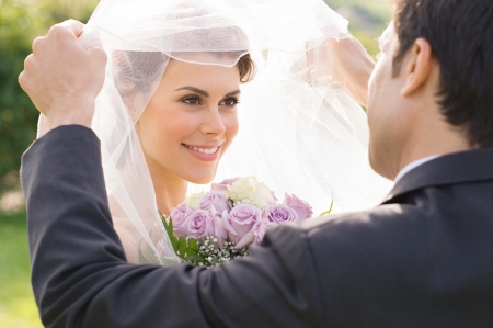 Closeup Of Groom Looking At Bride During the Wedding Ceremony