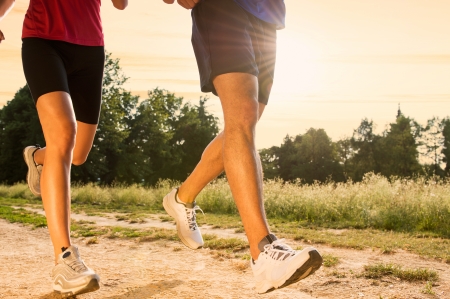 Legs View Of A Couple Jogging Outdoor in the Park