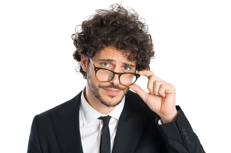 Portrait Of Thinking Man Wearing Eyeglasses Isolated On White Backgroundの写真素材