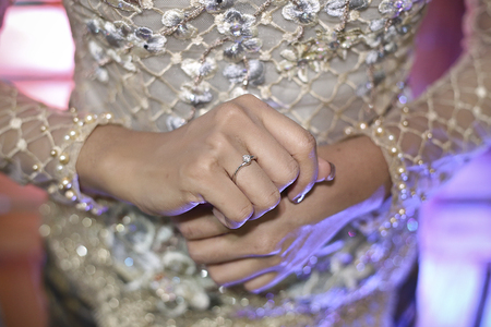 Beautiful Bride's Hand with Diamond wedding Ringの写真素材