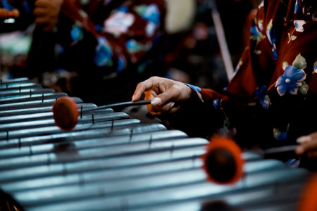 Man Playing Gamelan, Javanese Traditional Music Instrument