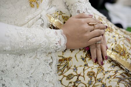 Traditional Javanese Woman Hands wearing batikの写真素材