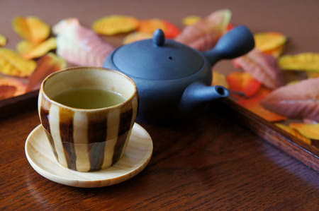 Cup and Japanese green teaの写真素材