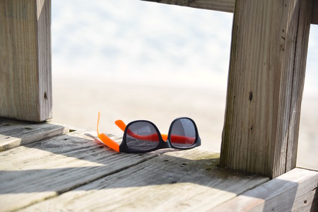 Sunglasses on Beach Boardwalkの写真素材