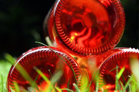 Trio of Wine Bottles - Bottom hum in lightの写真素材