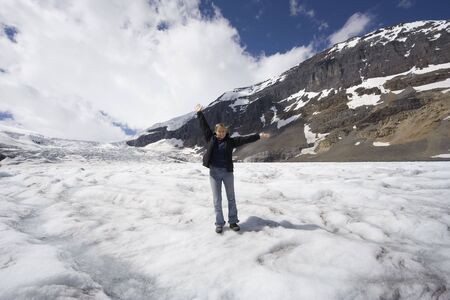 young woman in the snow - athabasca glacier, jasper national park, canada - の写真素材