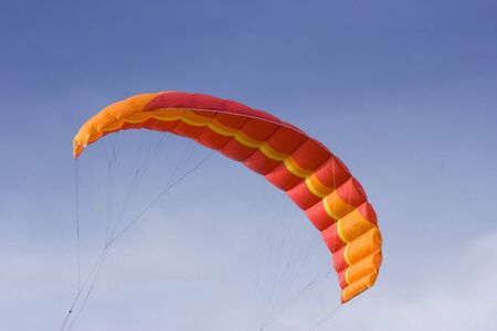 red power kite - this kite is a de-power foil and can be used for buggying, land-boarding or snowkiting -の写真素材
