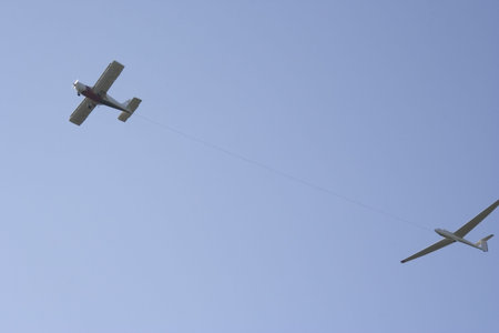 glider taken to the skies -  towing by aircraft -の写真素材