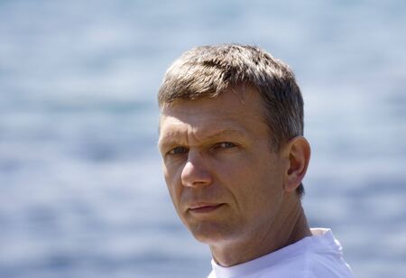 man lost in thought - french riviera, mediterranean seaの写真素材