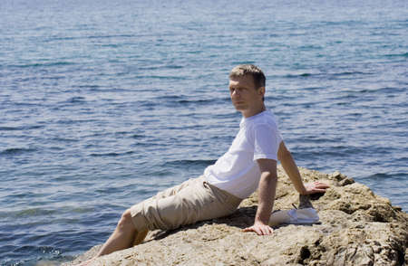 man relaxing - french riviera, mediterranean sea の写真素材