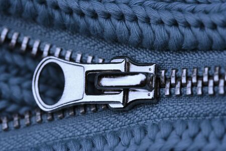 Close-up of an Open Zipper - part of a sweaterの写真素材