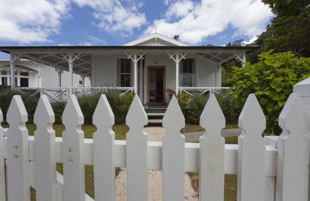 White Picket Fence in front of Detached House - Russell, Bay of Islands, Northland, North Island, New Zealandの写真素材