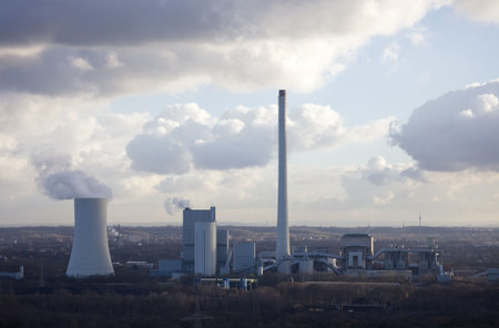 Industrial Plant with smoking Cooling Tower - Recklinghausen, North Rhine-Westphalia, Germanyの写真素材