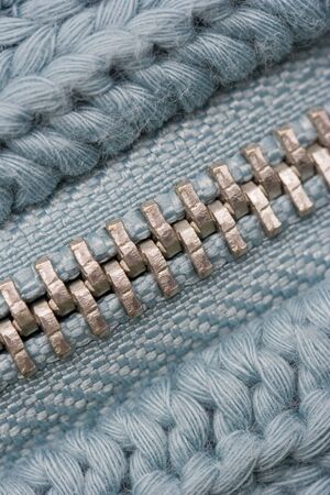 Macro of Closed Zipper on Sweater - Detail of Knitting Patternの写真素材