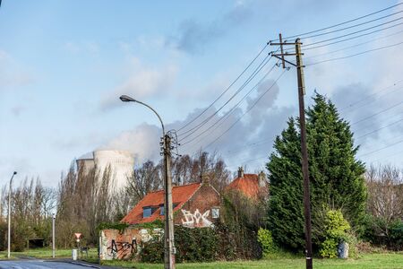Doel Belgium December 24 2019 Abandoned village Doel in Belgium as a ghost town taken over by grafity street art near the the nuclear power plantのeditorial素材