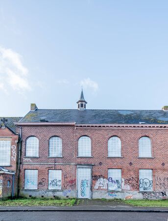Doel Belgium December 24 2019 Abandoned village Doel in Belgium as a ghost town taken over by grafity street art near the the nuclear power plantのeditorial素材