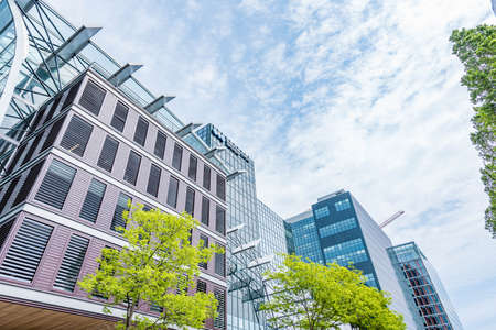 Amsterdam 29 September 2019 glass tower buildings in the financial center of the  city of Amsterdam in Holland the Netherlands called the Zuid-as and WTCのeditorial素材