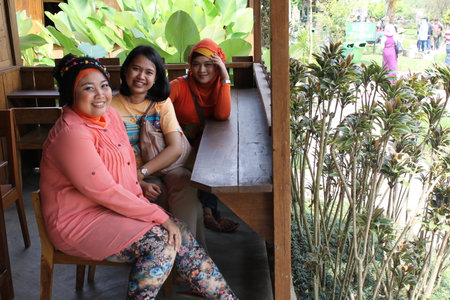 Lembang, Indonesia - Jan 22, 2023 : Diverse Women at a Coffee Shopのeditorial素材