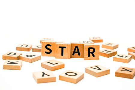 Wooden blocks with the word 'star' surrounded by other lettered blocksの写真素材