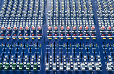 big mixer console in a concert stage