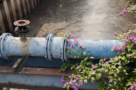 Blue Pipe of  opencast sewer system in Jakarta indonesiaの写真素材